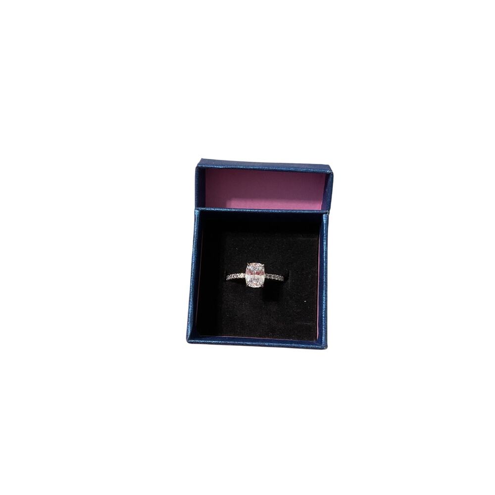 Size 9 Solitaire Ring. Metal and stones Unknown . Received in an Amazon Pallet